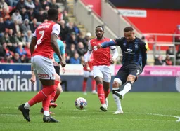Carlton Morris takes the shot from the edge of the penalty area