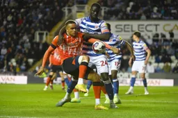 Naby Sarr has his arms all over Carlton Morris