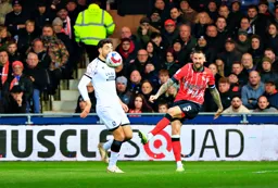 Sonny Bradley puts his foot through the ball