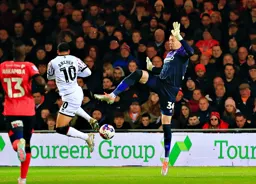 Ethan Horvath and Cameron Archer misjudge the flight of the ball