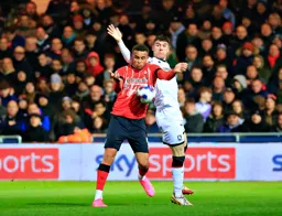 Carlton Morris controls the ball