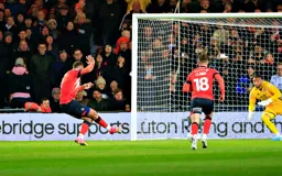 Carlton Morris scores Town`s second goal from the penalty spot