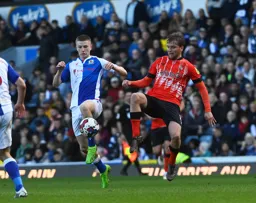 Luke Berry goes in with a raised foot