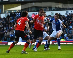 Carlton Morris brings the ball under control with Tom Lockyer in close support