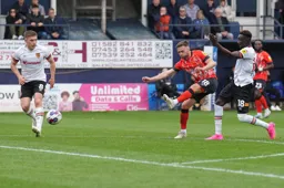 Jordan Clark takes a shot at goal