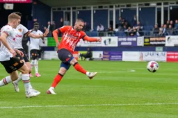 Henri Lansbury lets fly from just outside the penalty area