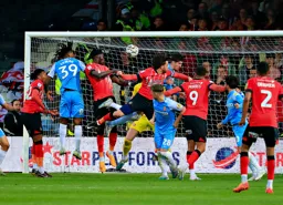 Tom Lockyer heads in the Town`s second goal