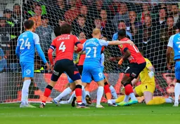 Gabriel Osho scores the Town`s first goal