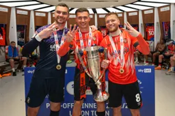 James Shea, Dan Potts and Luke Berry indicate their three promotion winning seasons with the Town