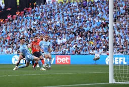Jordan Clark scores the Town`s goal to give them a first half lead