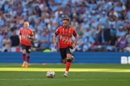 Jordan Clark works his way forward