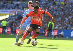 Gabriel Osho goes on a run with the ball