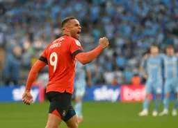 Carlton Morris has scored the first in the penalty shoot out