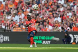 Marvelous Nakamba lofts the ball forward
