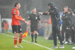 Alfie Doughty asks the boss can he borrow his raincoat