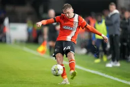 Alfie Doughty fires in a cross