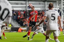 Carlton Morris heads for goal from a corner