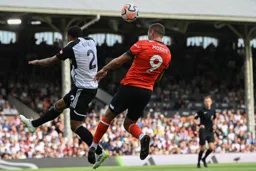 Carlton Morris heads back across goal