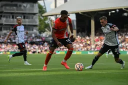 Jacob Brown rounds the defender