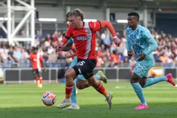 Alfie Doughty strides down the wing