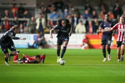 Tahith Chong drives towards goal