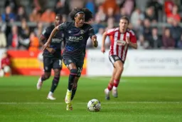 Tahith Chong heading towards goal