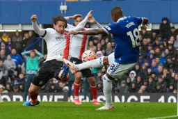 Tom Lockyer gets on the end of a poor clearance from Ashley Young