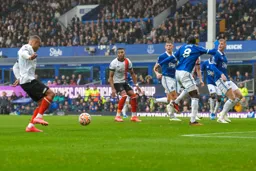 Carlton Morris strokes home the second goal