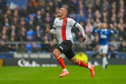 Carlton Morris takes off after scoring