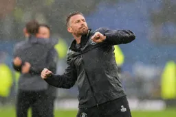 Rob Edwards punches the air following the first win of the season