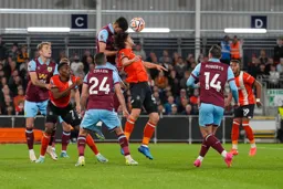 Tom Lockyer outjumped by the Burnley defender