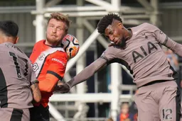 Luke Berry jumps with Emerson Royal