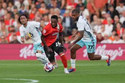 Shandon Baptiste bursts through with the ball