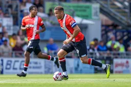 Carlton Morris in full flight moves up field with the ball