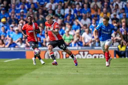Alfie Doughty moves forward with the ball