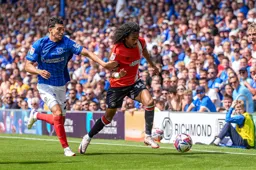 Tahith Chong is closed down by Jordan Williams