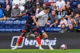 Elijah Adebayo is held off the ball