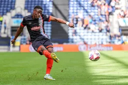 Chiedozie Ogbene sends the ball towards the penalty area