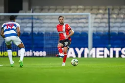 Jordan Clark makes a sidefoot pass
