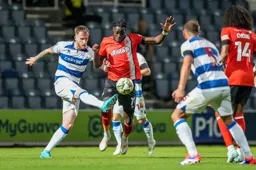 Elijah Adebayo is beaten to the ball