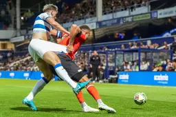 Carlton Morris grabs a handful of his marker shorts