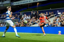 Alfie Doughty attempts to deliver a cross but Jimmy Dunne is in the way