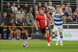 Jordan Clark makes a run in midfield