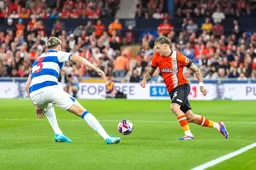 Alfie Doughty runs at Jimmy Dunne