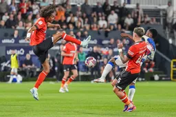 Tahith Chong and Karamoko Dembele go in with raised boots