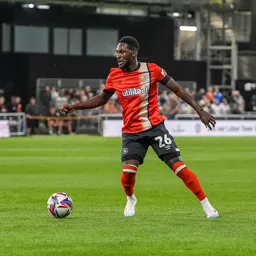 Shandon Baptiste looks for support
