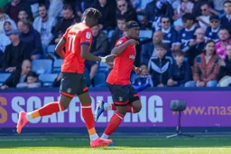 Teden Mengi has just scored the only goal of the game