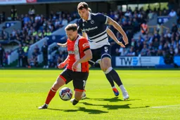 Jordan Clark holds off his marker