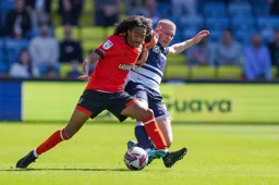 Tahith Chong shows some strength to win the ball