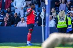 Teden Mengi lets the crowd know that he has scored